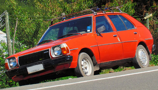 Började säljas 1977 och är en Mazdas mest sålda bilmodeller. Såldes i vissa delar av världen under modellnamnet ”Familia”.